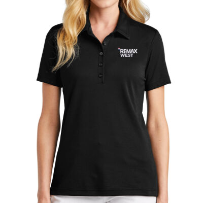 TravisMathew Women's Oceanside Solid Polo - RE/MAX West Embroidered Thumbnail